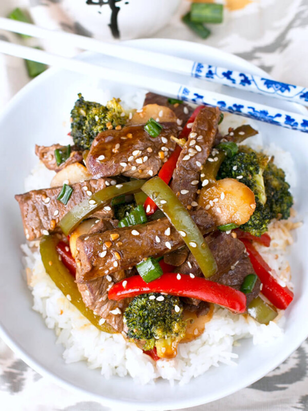 The combination of tender beef, fresh vegetables, and a rich garlic stir fry sauce