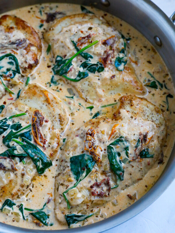 Top down shot of tuscan chicken in a pot.