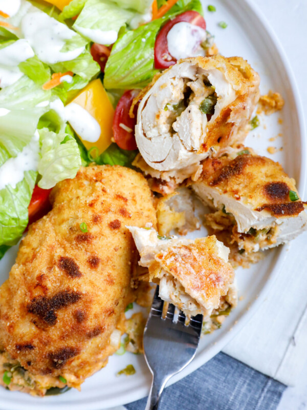 Top down view of jalapeno popper chicken and a fork.