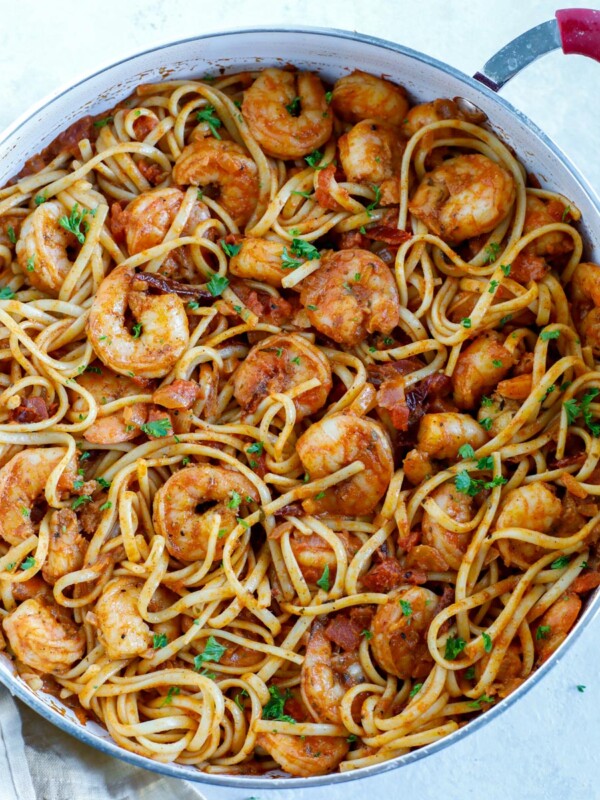 Overhead shot of spicy shrimp pasta in a skillet.