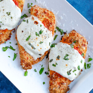 Baked parmesan chicken with marinara sauce and cheese