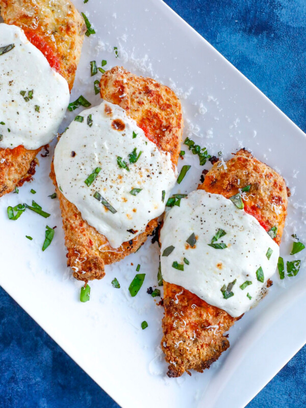 Baked parmesan chicken with marinara sauce and cheese