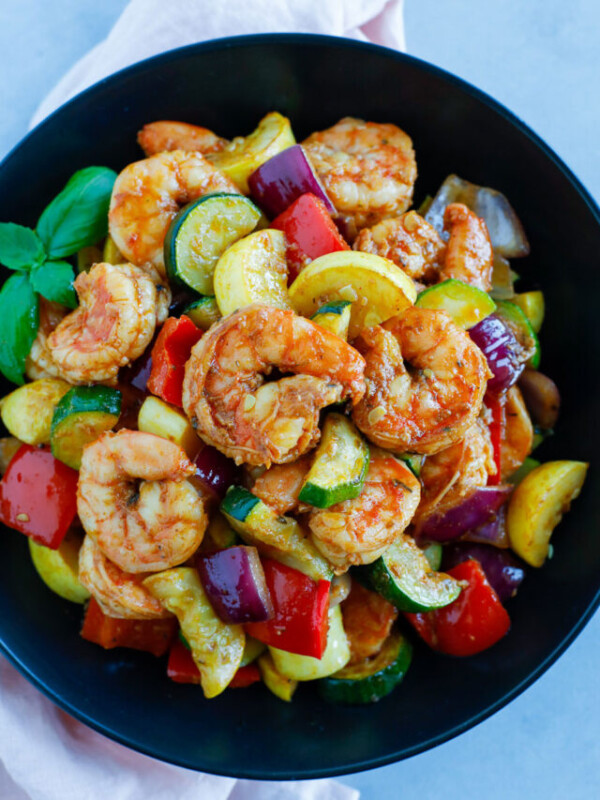 Shrimp and Vegetable served on a black plate