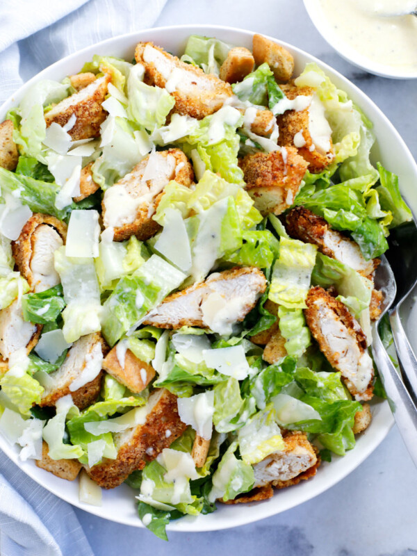 chicken caesar salad served in a dish