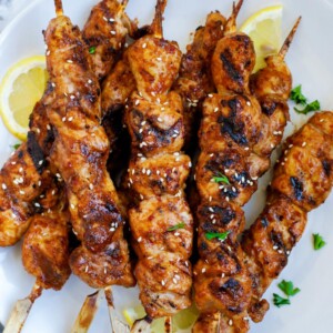 grilleed koream bbq chicken skewers on a plate