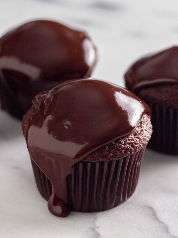 chocolate ganache topped on a cupcake