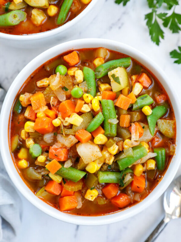 Overhead view of a bowl of vegetables soup.