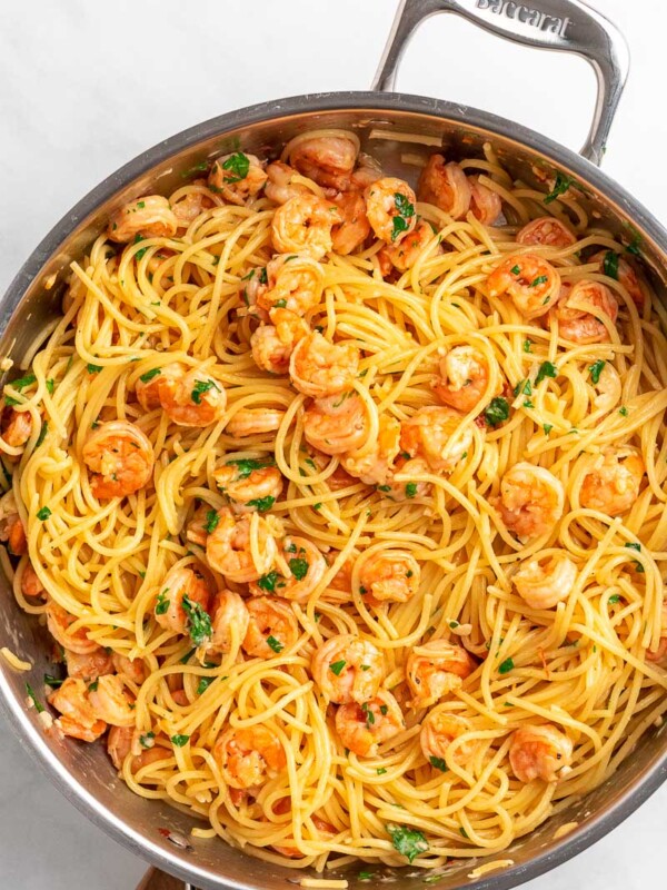 top down shot of shrimp spaghetti in a skillet