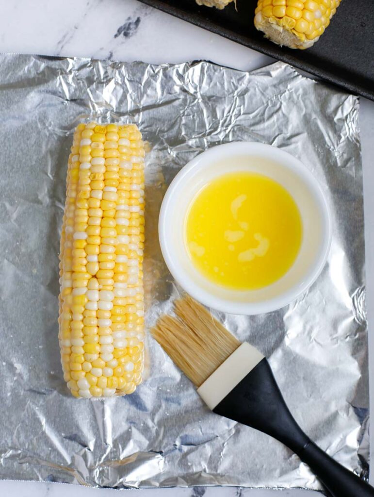 https://www.cookinwithmima.com/wp-content/uploads/2021/06/mexican-corn-1-771x1024.jpg