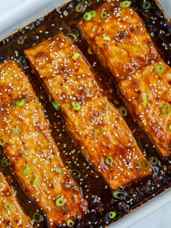 Baked teriyaki salmon in a baking dish.