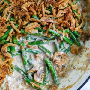 green bean casserole with a portion removed