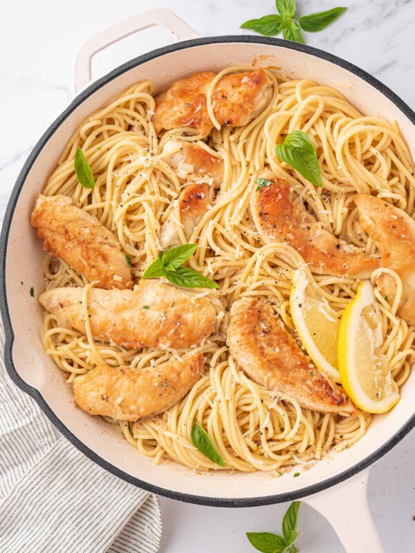 Chicken scampi pasta in a skillet.