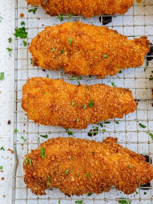 crispy baked chicken tenders on a baking rack