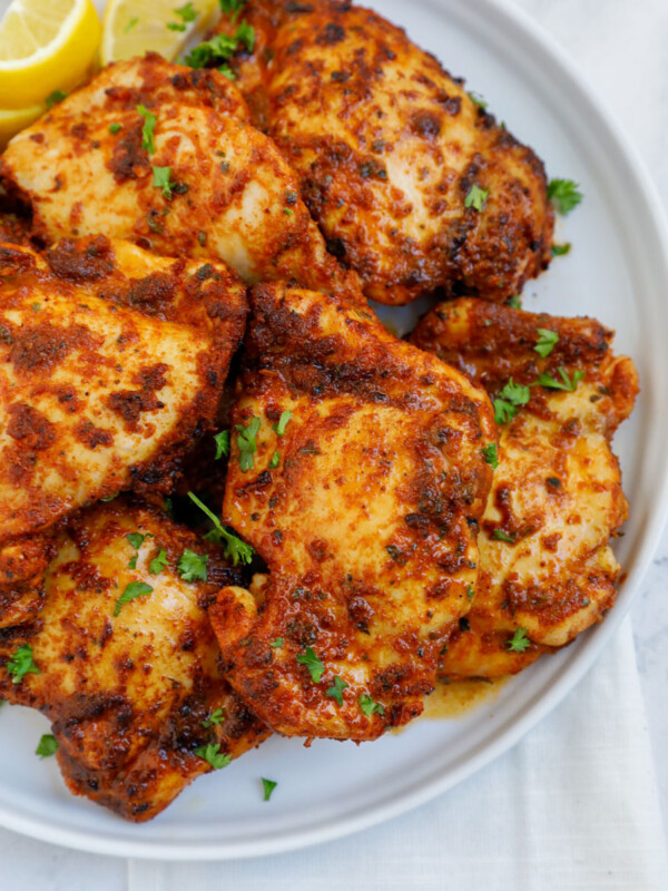 air fried boneless chicken thighs serves on a plate