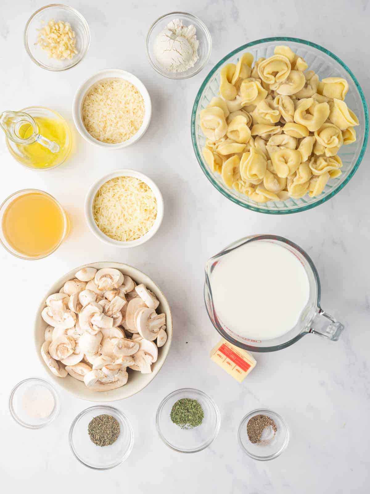 Ingredients needed for cheese tortellini alfredo.