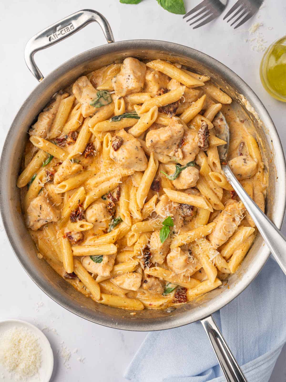 A spoon serves marry me chicken pasta.