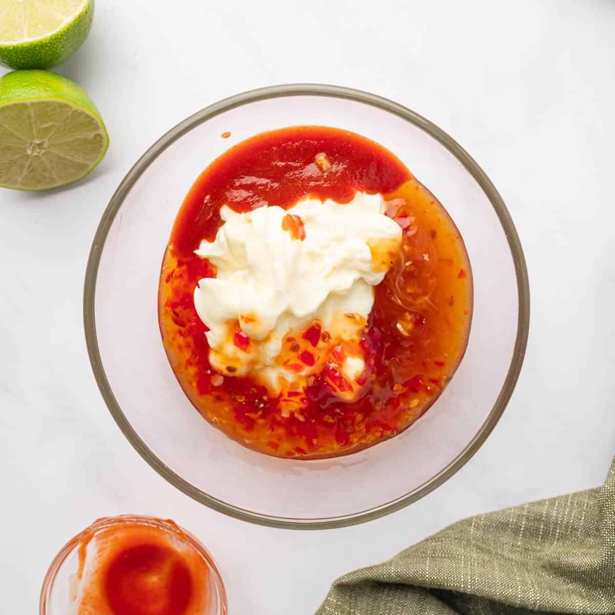 Making bang bang sauce in a bowl.