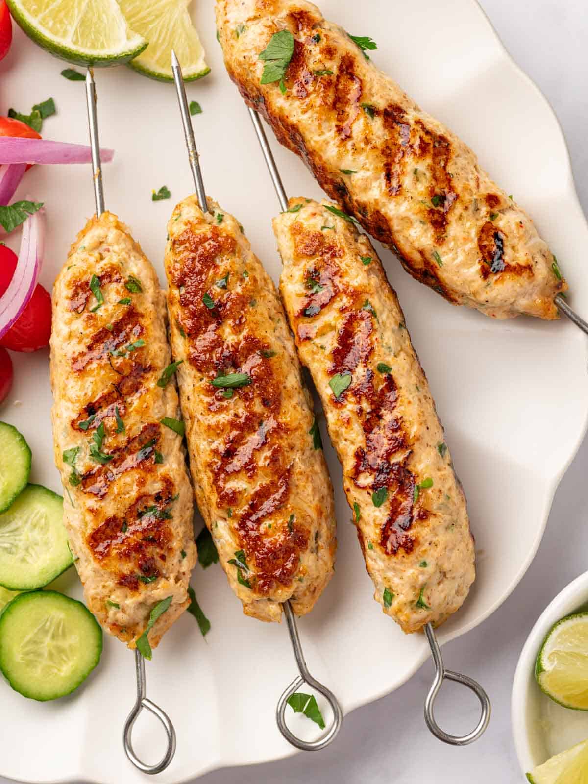 Closeup of grilled chicken skewers.