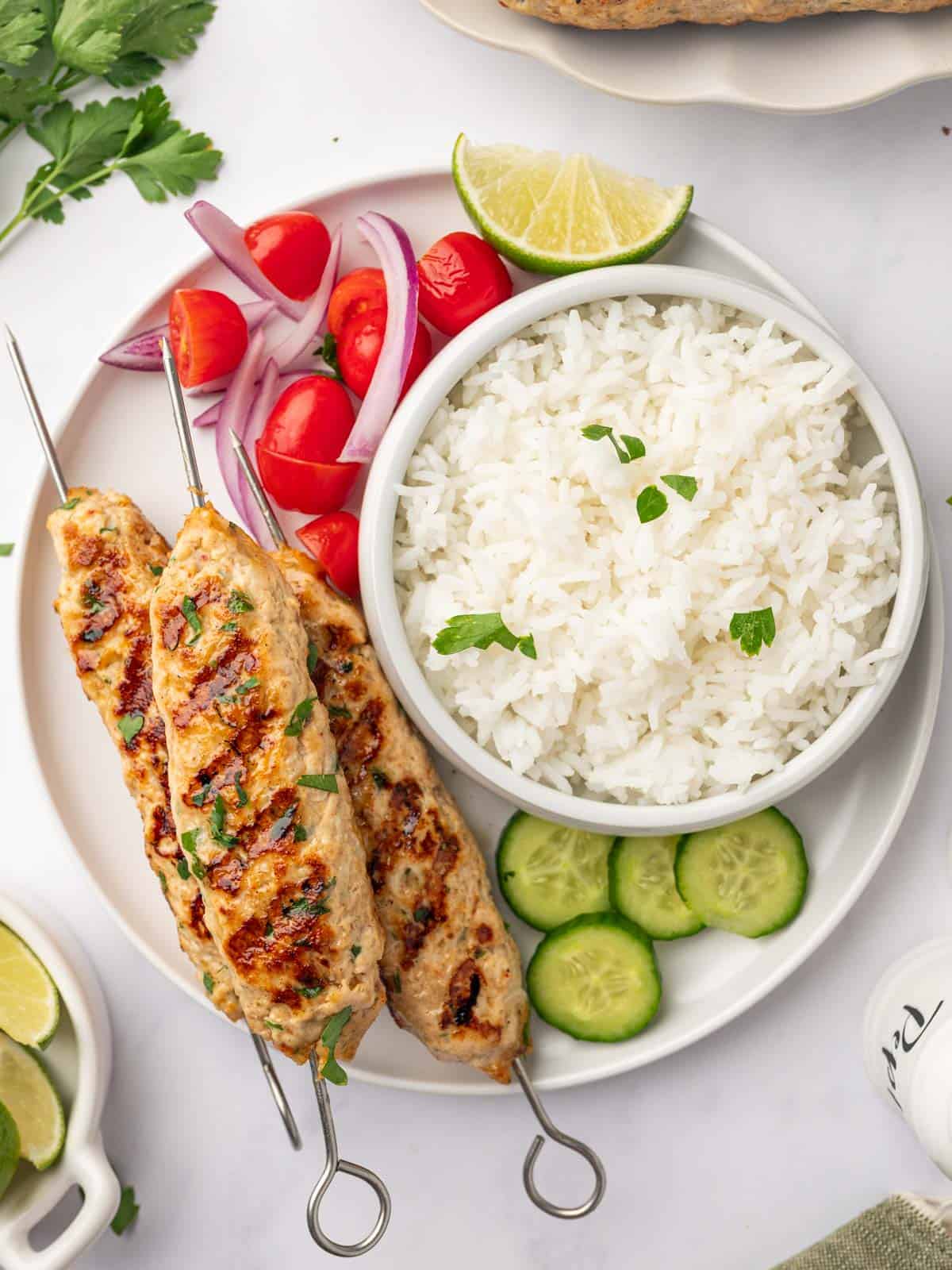 Grilled chicken kofta with rice and vegetables.