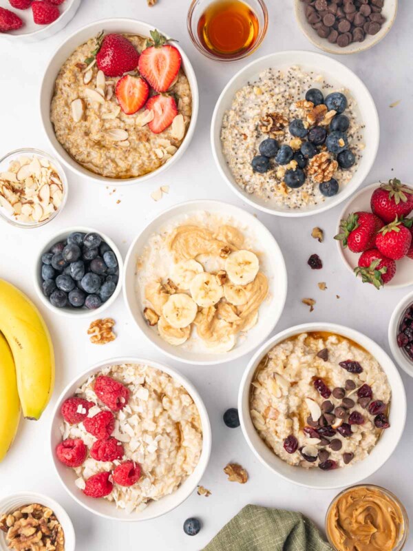 Different bowls of oatmeal prepared in different ways.